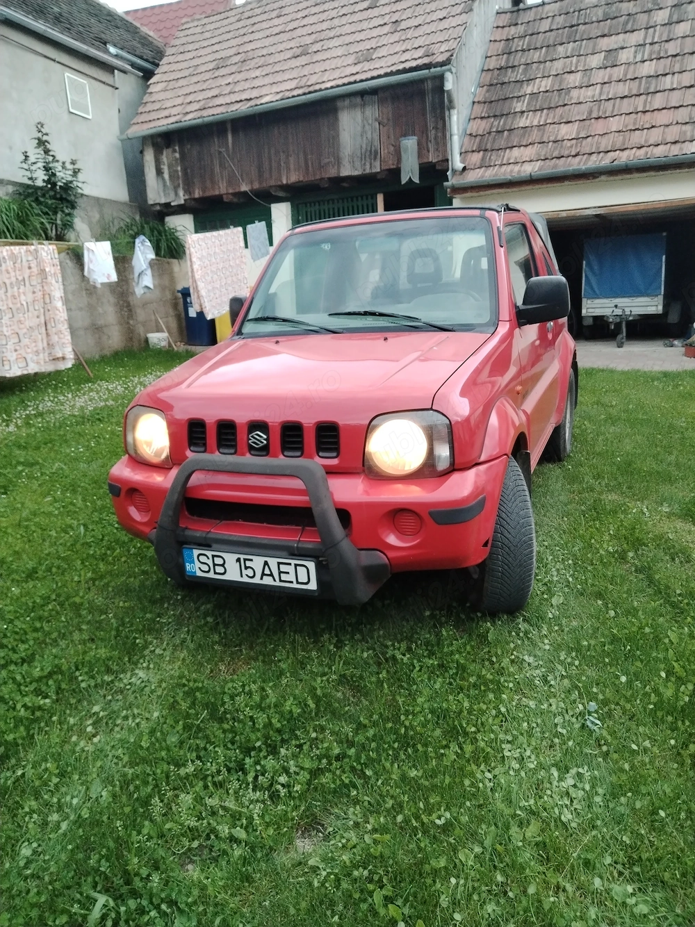 Suzuki jimny rosu