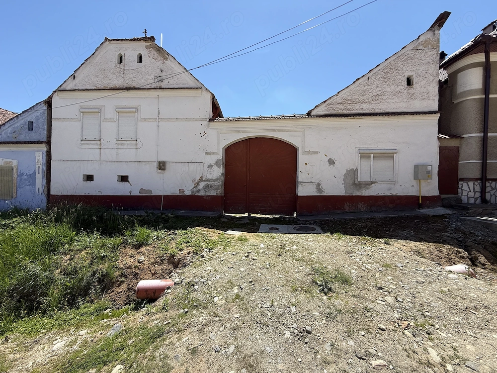 Casă cu curte și anexe în Poiana Sibiului