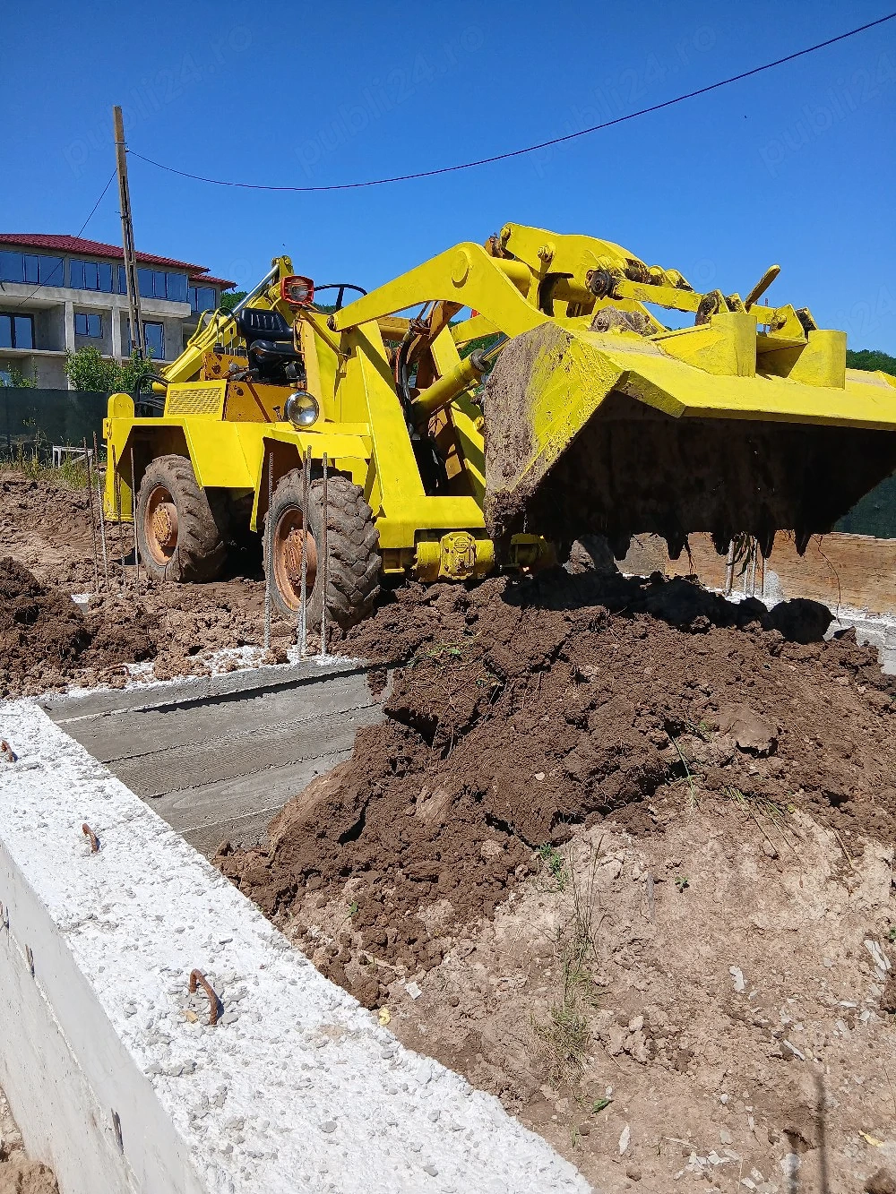 vola incarcator frontal cu brat pt sapat