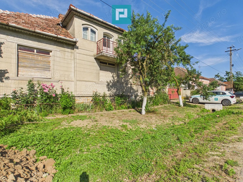 Casă cu 4 camere și teren de 2880 mp în Fiscut