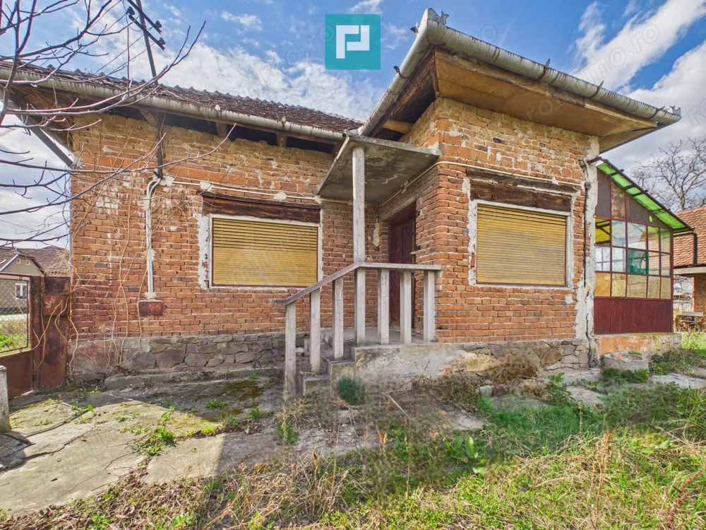 Casă cu teren de 1800 mp, în Buteni, Arad