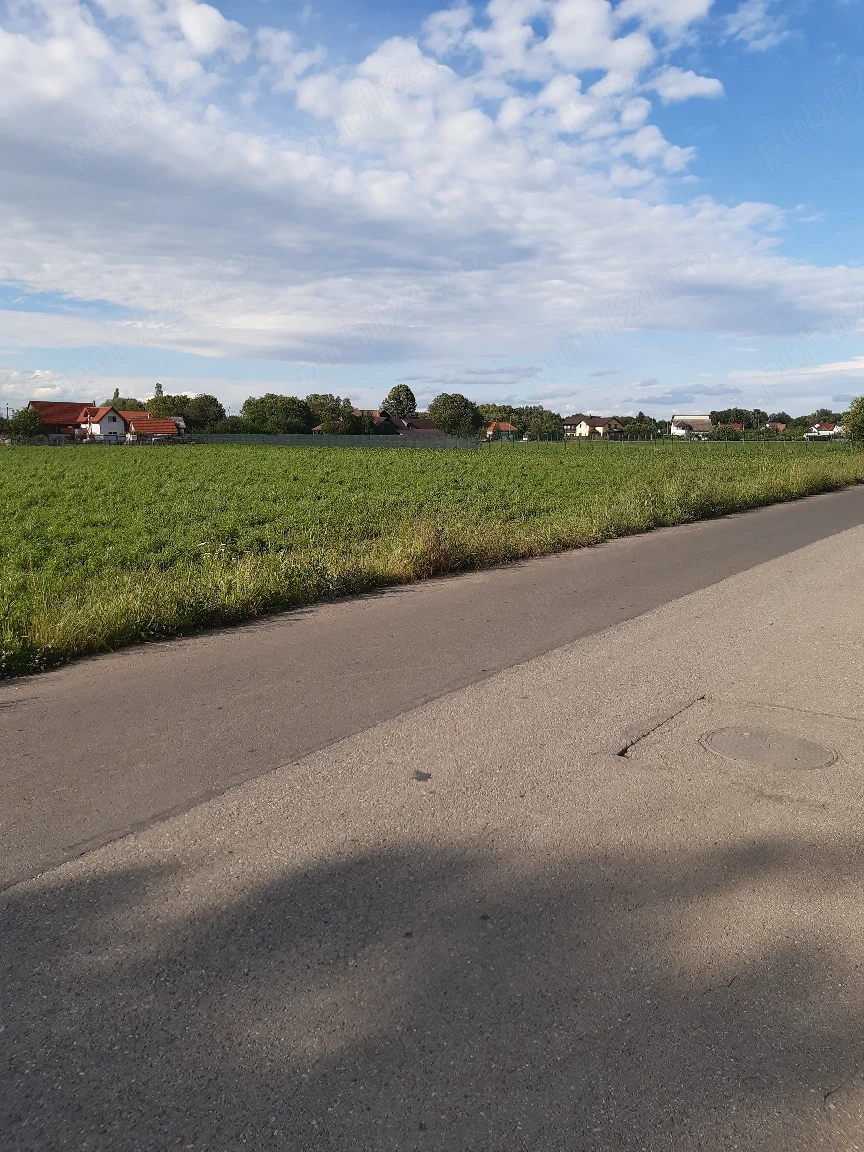 Teren construibil intravilan drum asfaltat utilitati central Lunca Calnicului