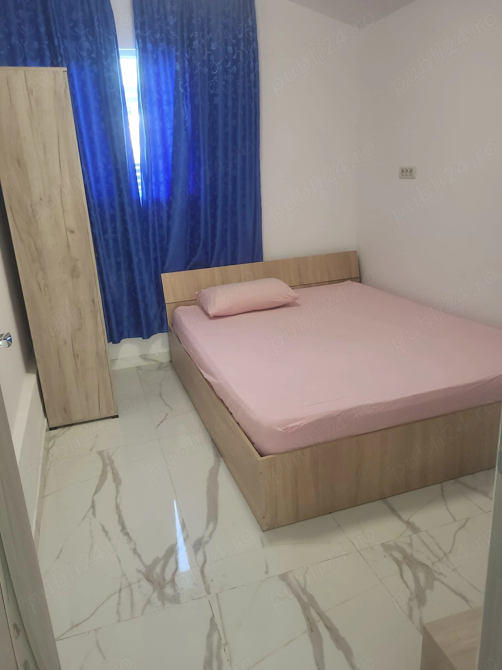 Închiriez casă cu 4 camere  2 bai