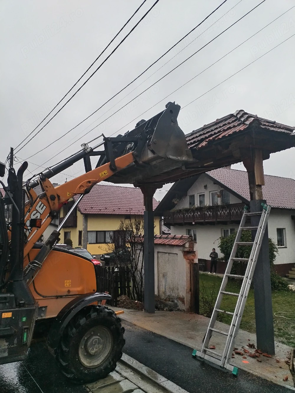 Închirieri buldoexcavator..... 