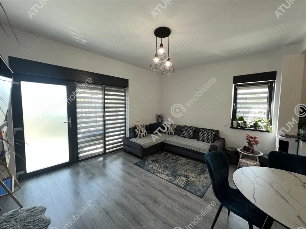 Apartament cu 3 camere si gradina proprie de 85 mp zona Brana