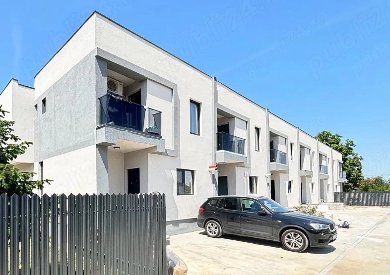 Casă 108 mp utili 3 cam, 2 băi 2 dresinguri ,1 balcon curte proprie 35 mp, 2 locuri de parcare