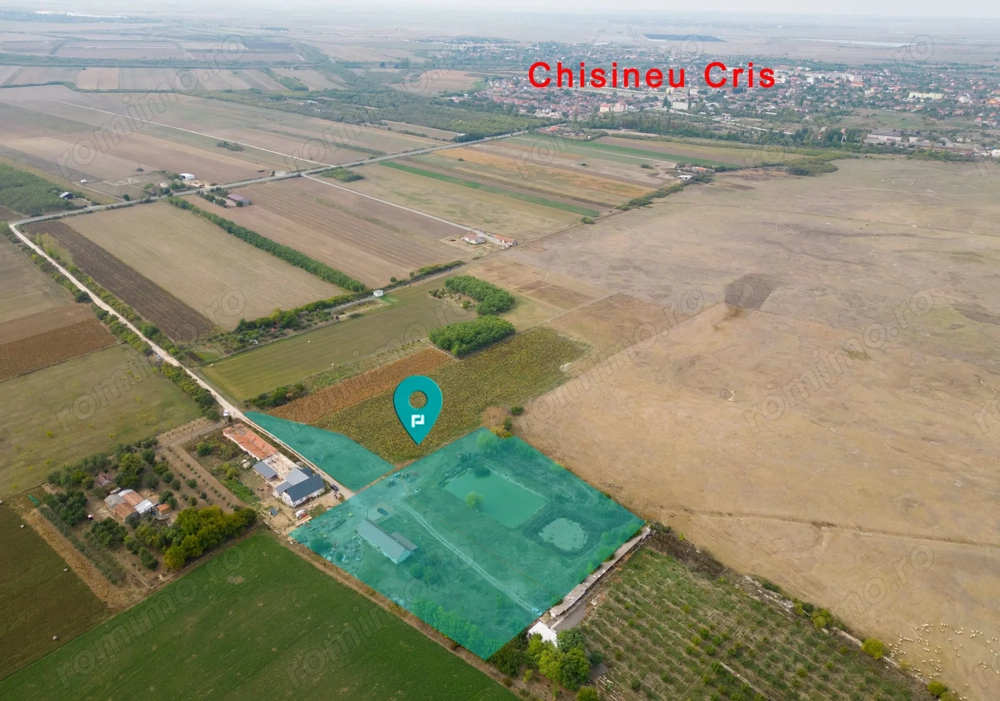 Teren 13.418 mp intravilan cu casă și 2 iazuri