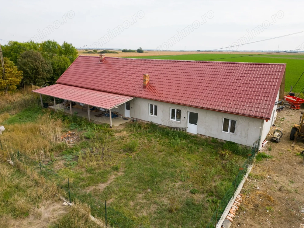 Casă cu teren 13 418 mp intravilan