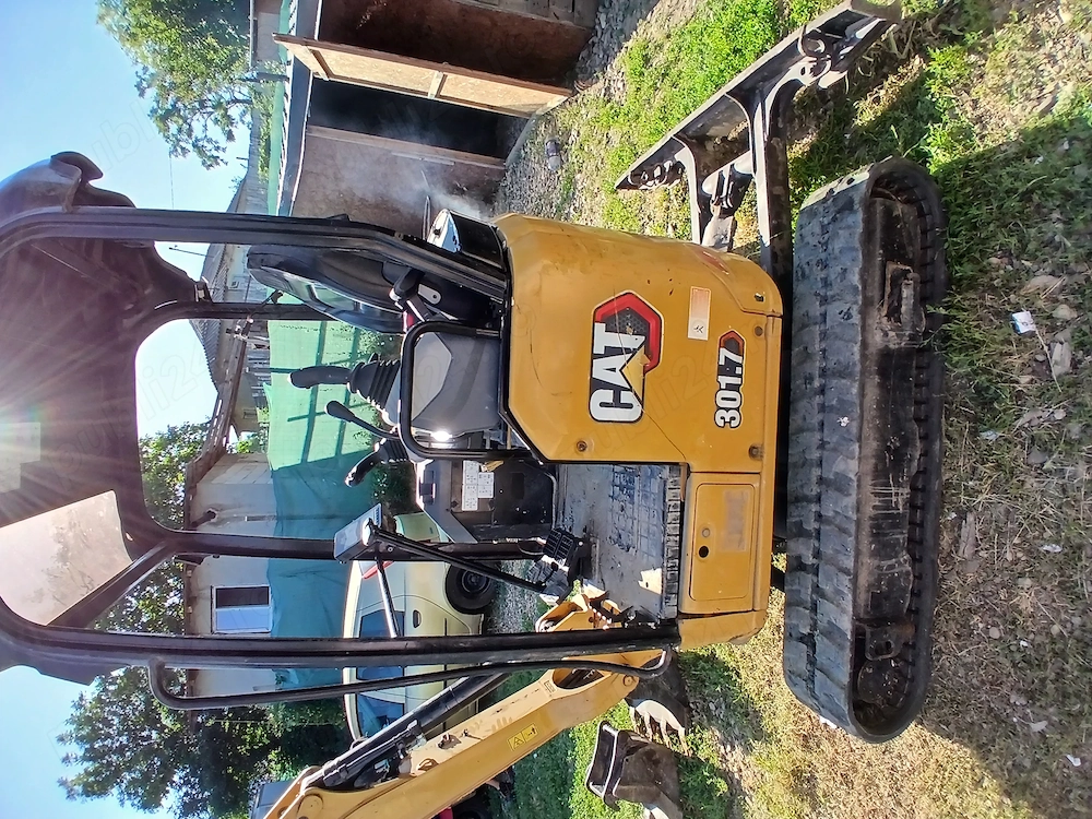 Vând miniexcavator CAT 