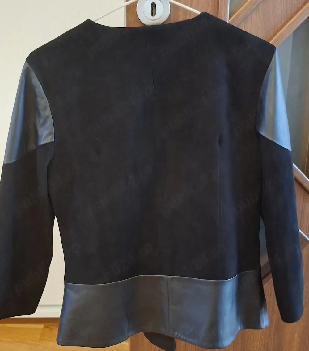 Geaca neagra de piele intoasa