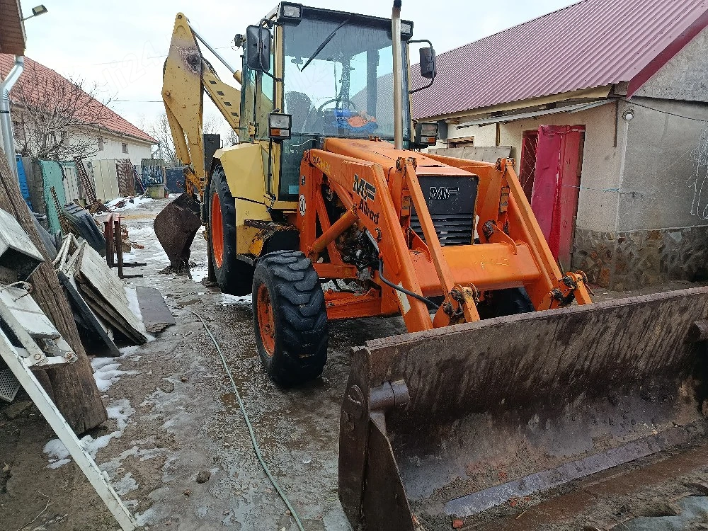 Schimb Buldoexcavator 