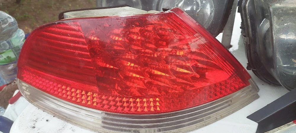 stopuri si set de faruri Bmw e65