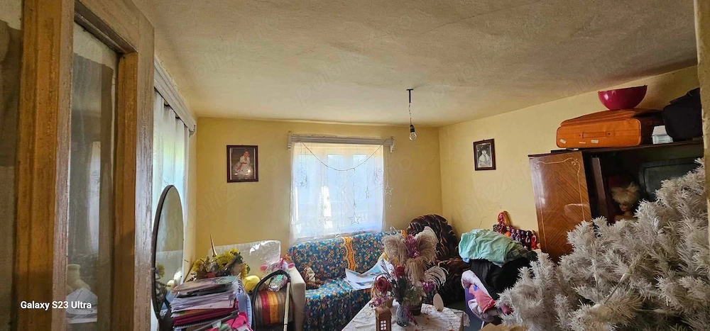 Casă de vânzare Băilești   3 camere, utilități, beci și curte cu boltă