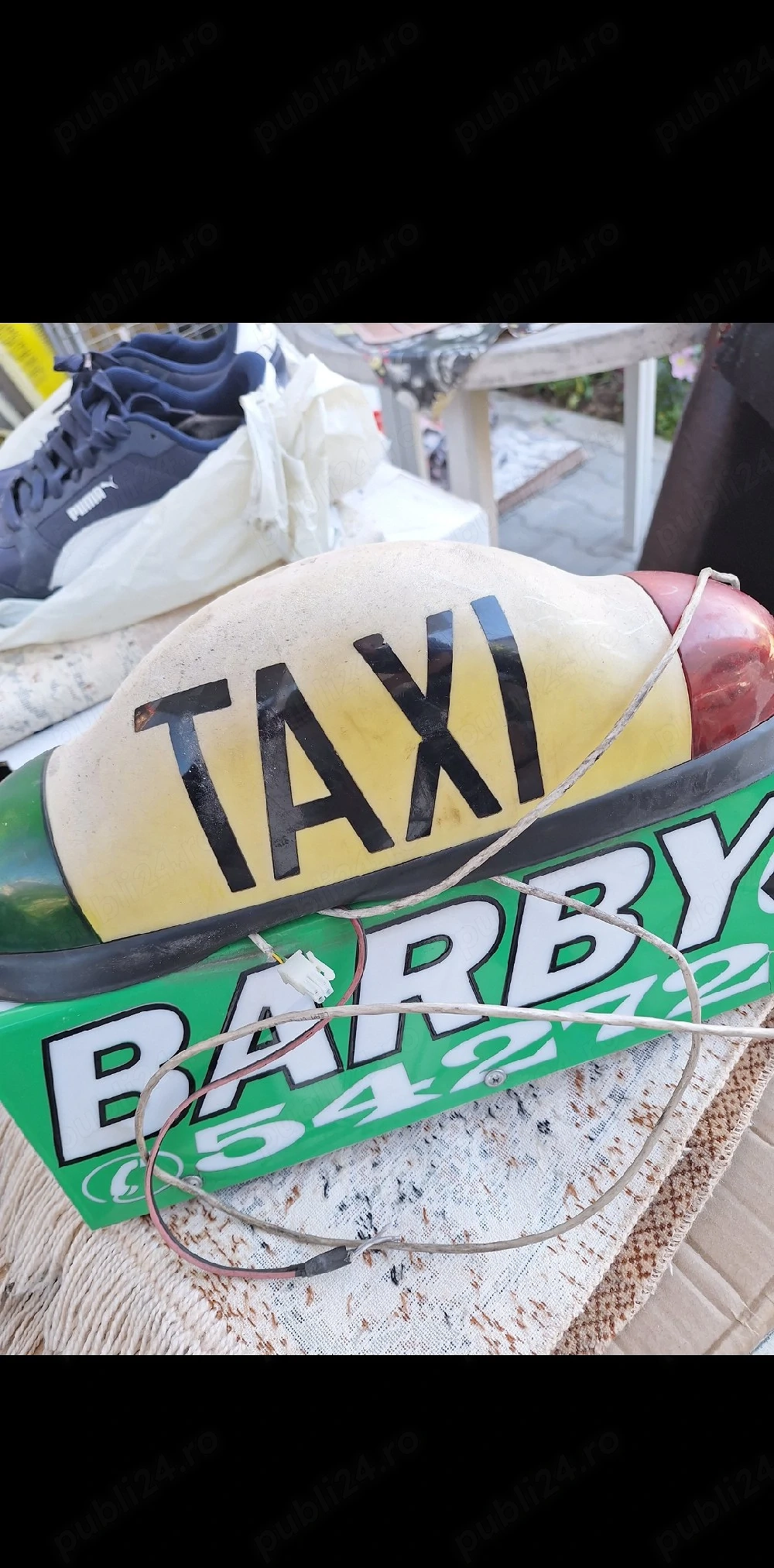 Casetă publicitară taxi