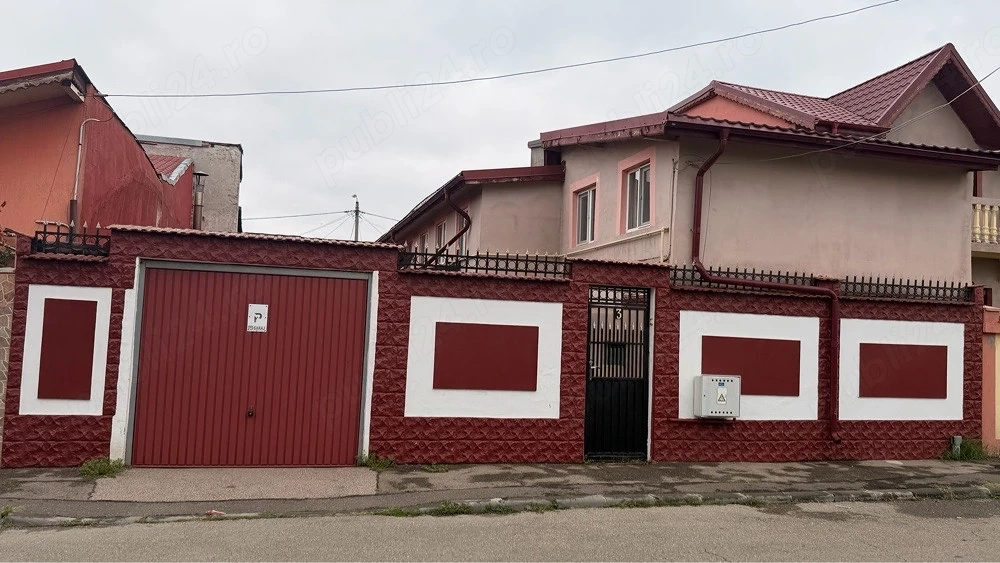 casa la curte de vanzare