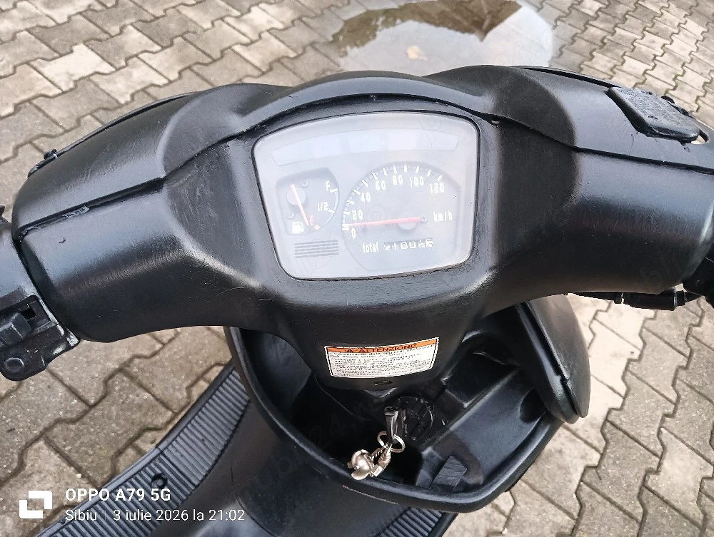 scuter Suzuki Hocuto 
