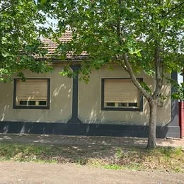 Vand casa din caramida, la strada principala, in Sannicolau Mare