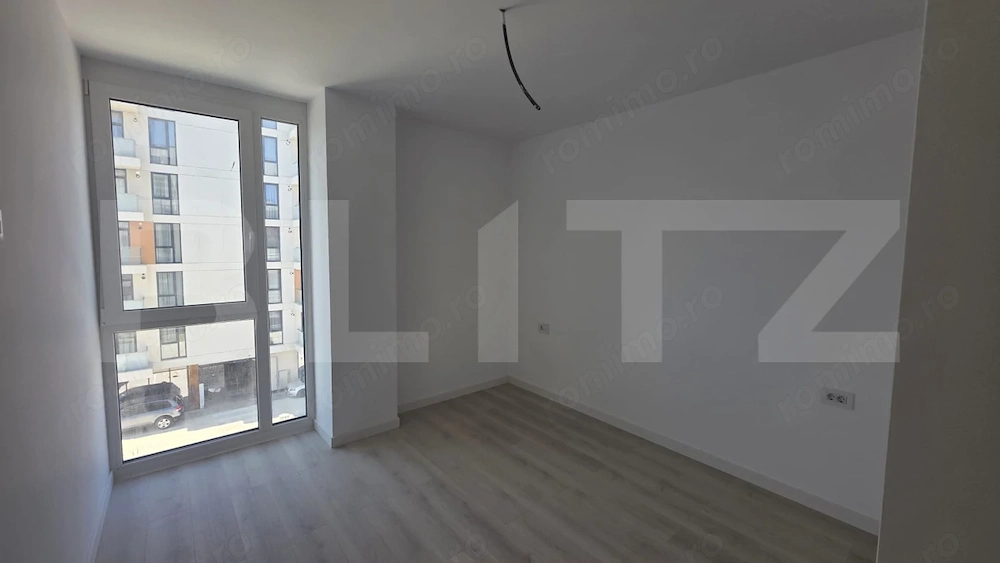 Apartament 2 camere, decomandat, etaj 3, parcare subterană inclusă 