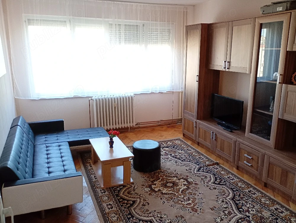 Urgent!!!Apartament 2 camere decomandat,garaj cu CF+boxa comuna zona centrala
