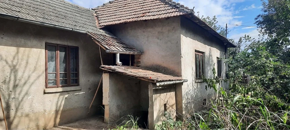    Casă de vânzare + teren intravilan 25 ari (2500mp)  Motăței, Dolj