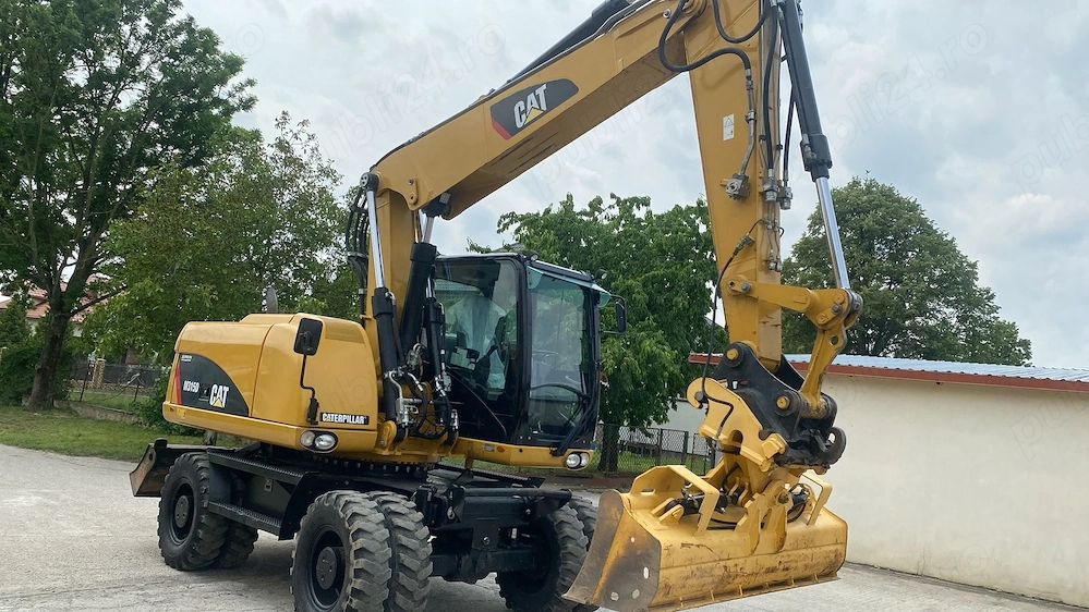 Vând Excavator Cat