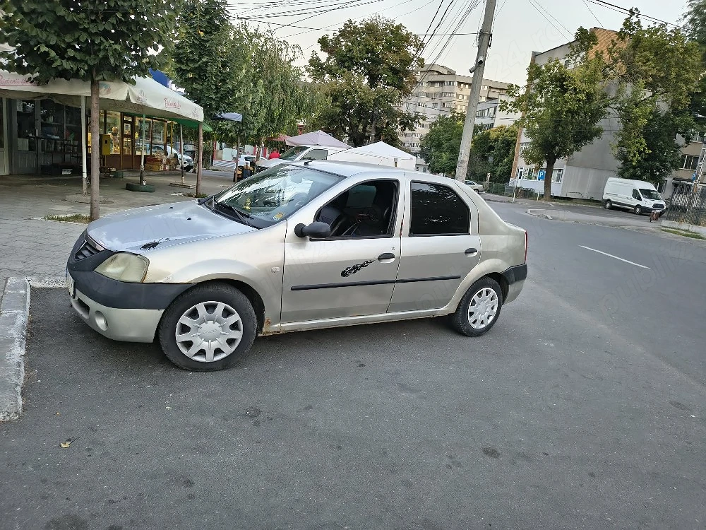 vând dacia logan