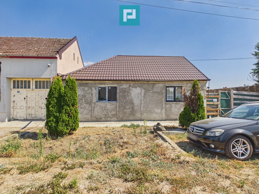 Casă cu teren de 2.134 mp în Sântana | 5 camere
