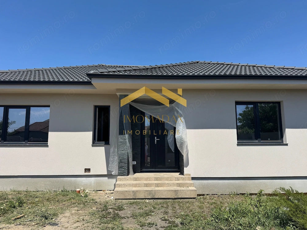 -Casa individuală -4 camere -2 băi -