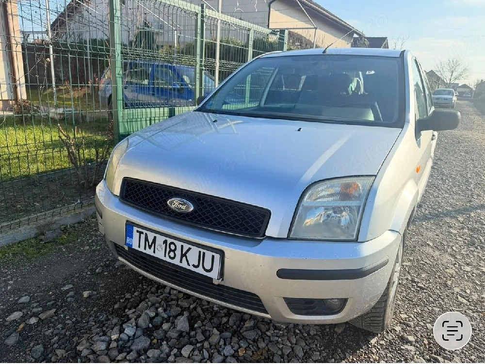 Ford Fusion 1.4 diesel, cu clima si geamuri electrice