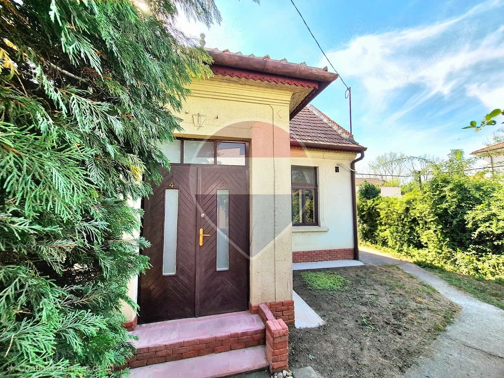 O casă cu aer boem, la câțiva pași de Mureș