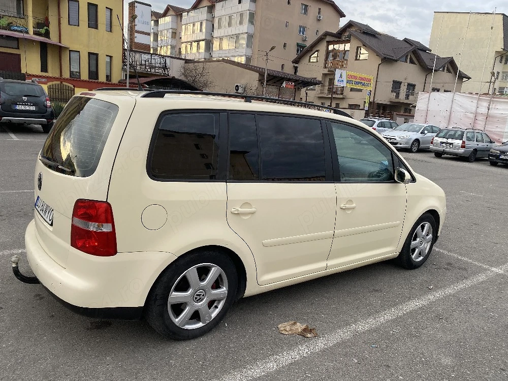 Vând volkswagen Touran 7 locuri . motor 1.9