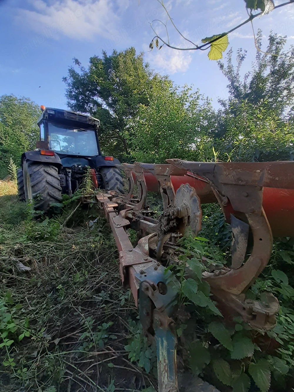 Tractor Hurlimman si plug 4 cormane reversibil
