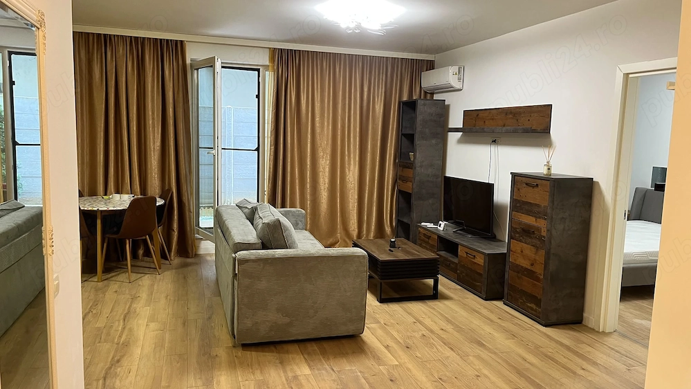 Inchiriez apartament cu 2 camere 59mp+boxa 4.34 mp+curte 31mp, in Pipera, cartier MTM, rond OMV