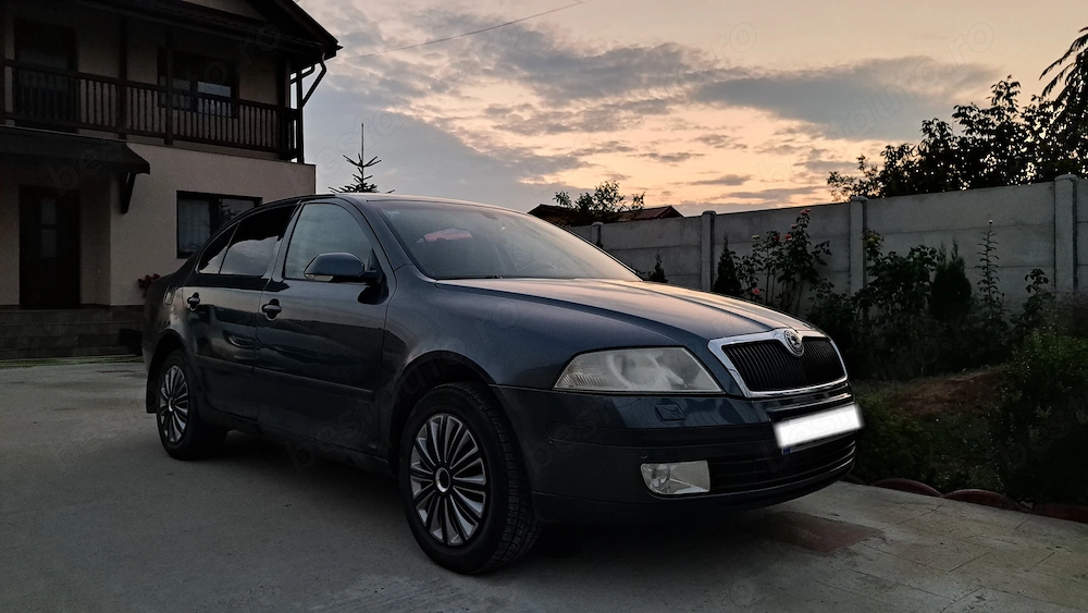  Skoda Octavia 2 (2006)   1.6 FSI , 115 CP 