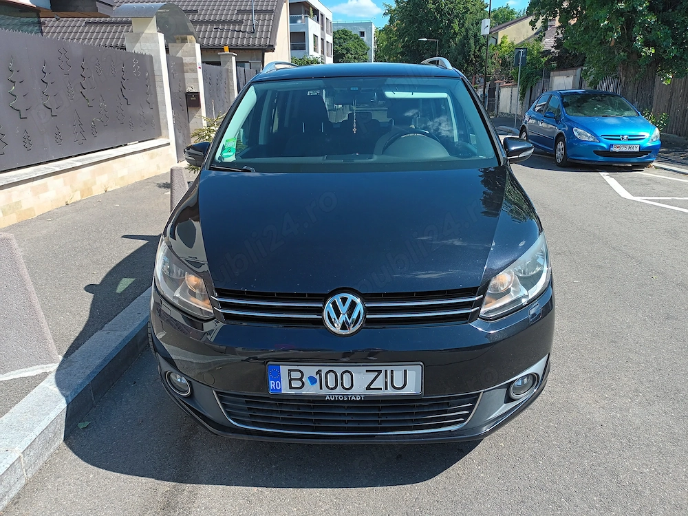 Touran 2012,propietar de 7 ani.