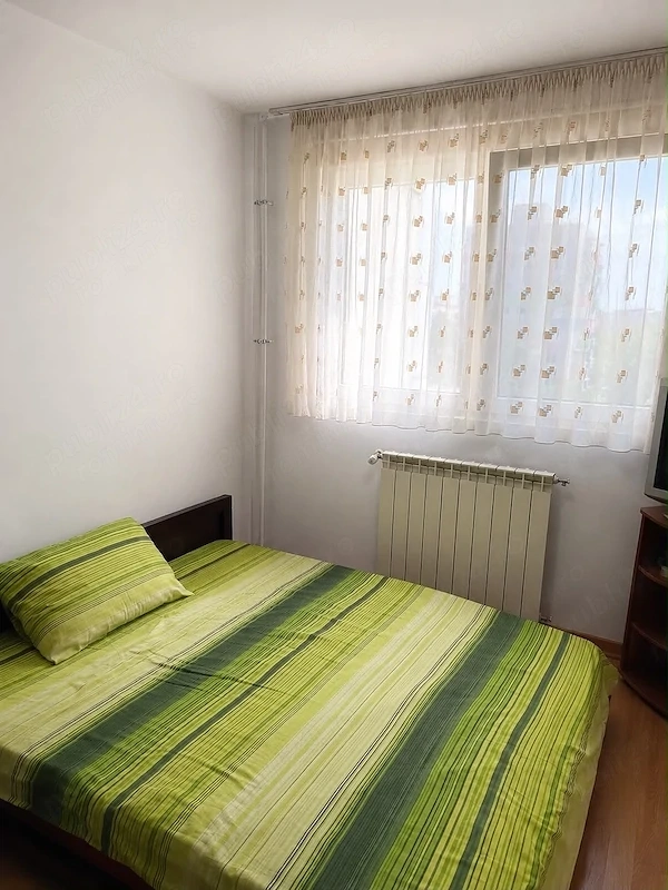 Închiriez apartament cu 3 camere +loc de parcare
