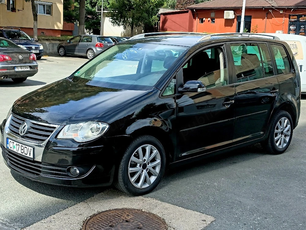 vând vw touran sau schimb 