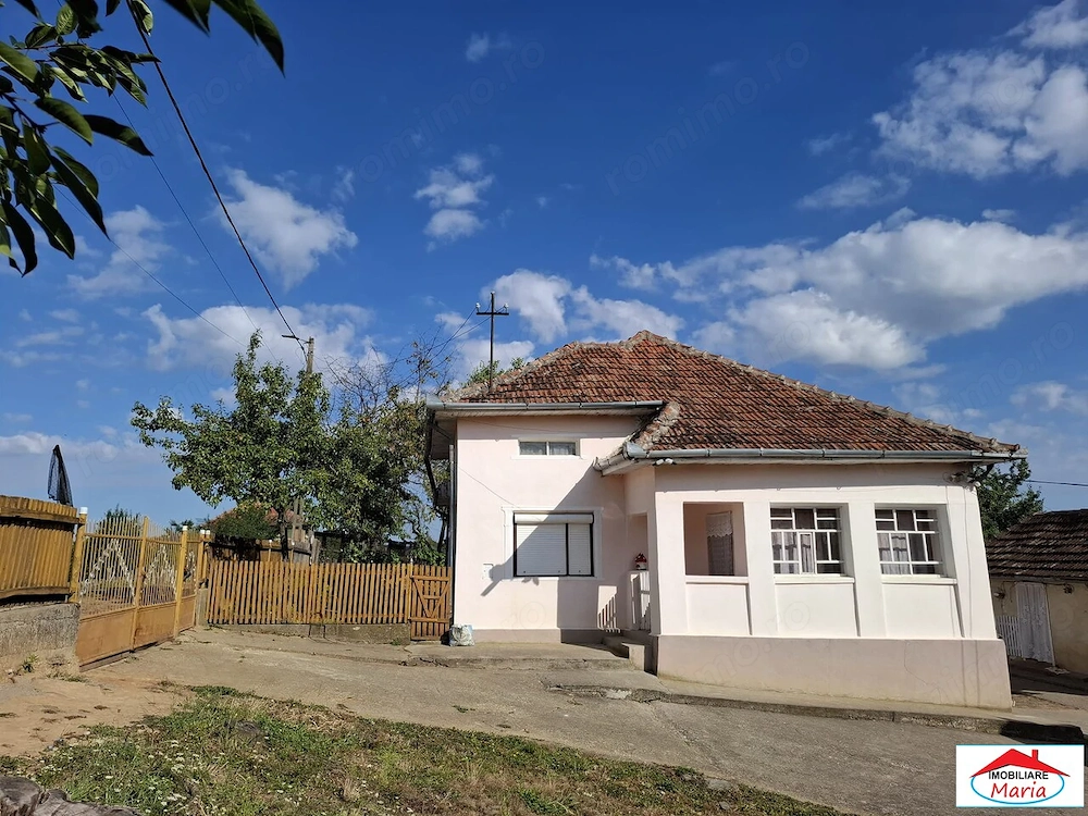 Casa cu teren si gospodarie in Cuta- Socond 29000 Euro
