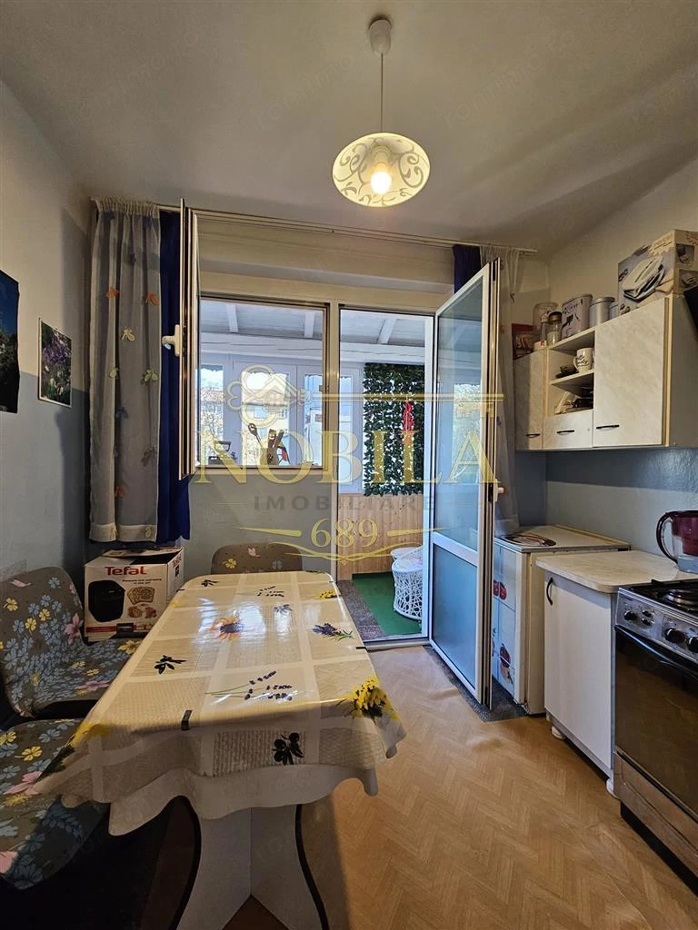 Apartament cu GRADINA SI ACOPERIS  MANSARDA DE VANZARE IN ONESTI ETJ 1