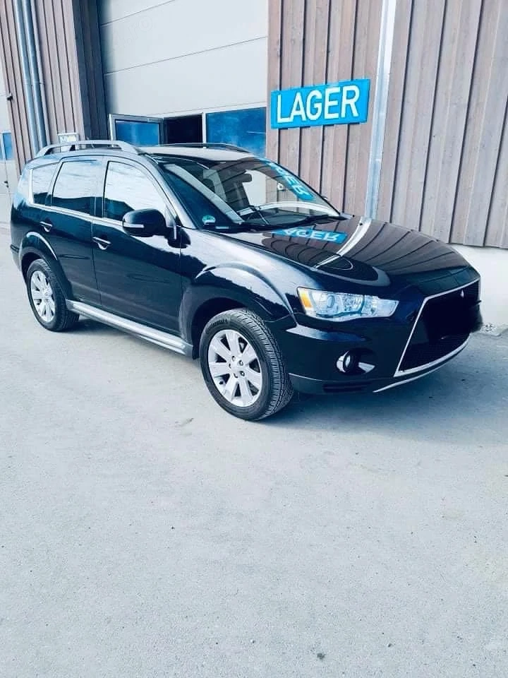 Vand Schimb Mitsubishi Outlander