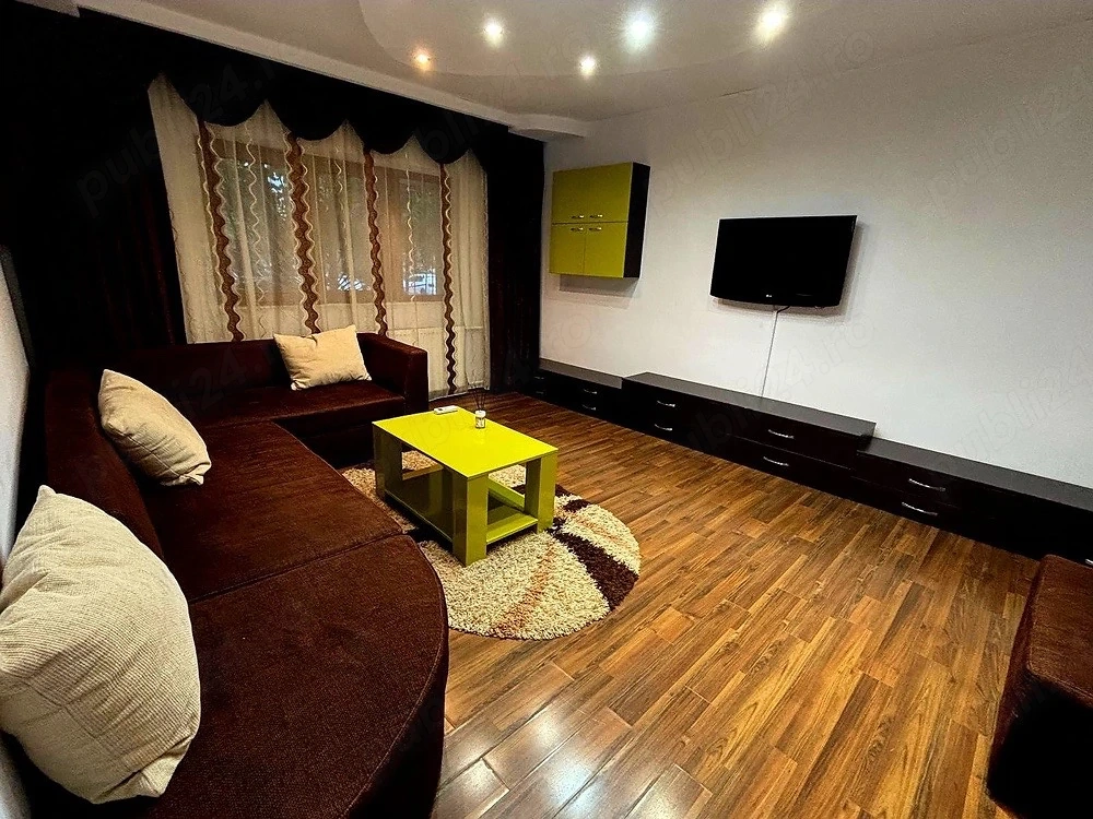 Se oferă spre închiriere un apartament spațios, luminos și complet mobilat și utilat, situat într-o 