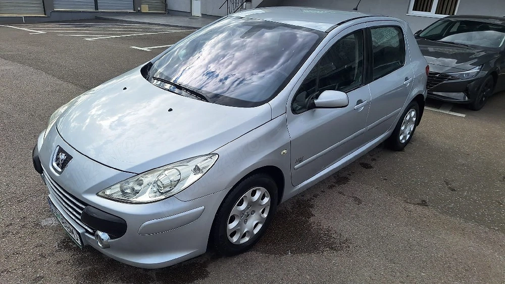 peugeot 307 1,6 i.  80000 km reali unic proprietar de nouă 