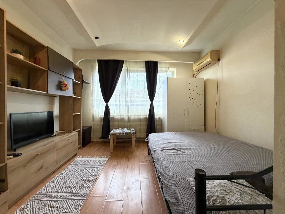 Apartament cu o camera, 17 mp utili, etaj 4, mobilat- Buziasului