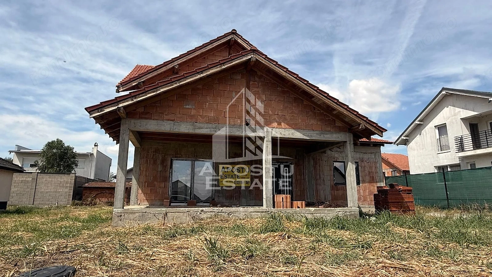 Casa la rosu de vanzare, aproape de Timisoara