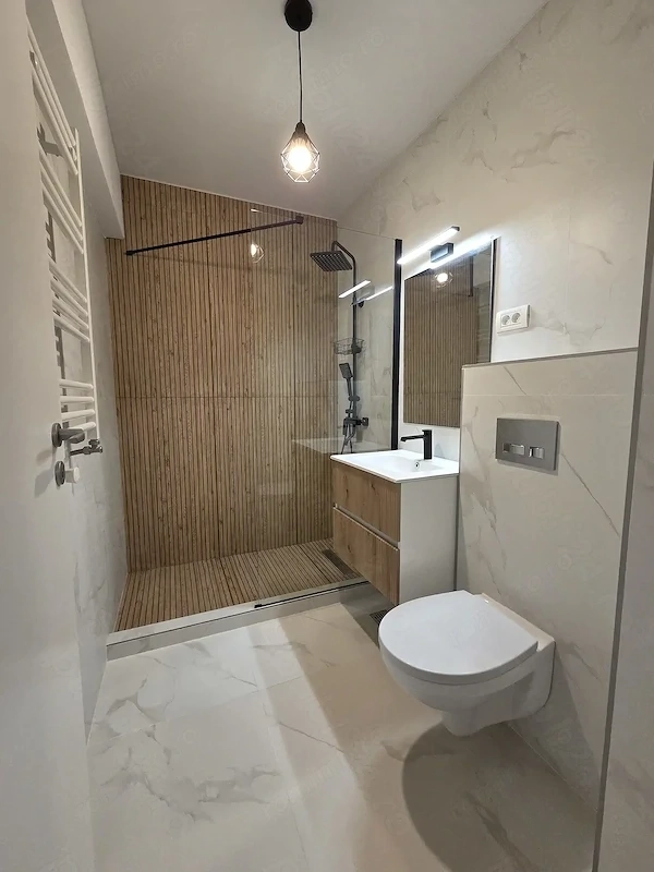 Închiriez apartament 2 camere tip studio
