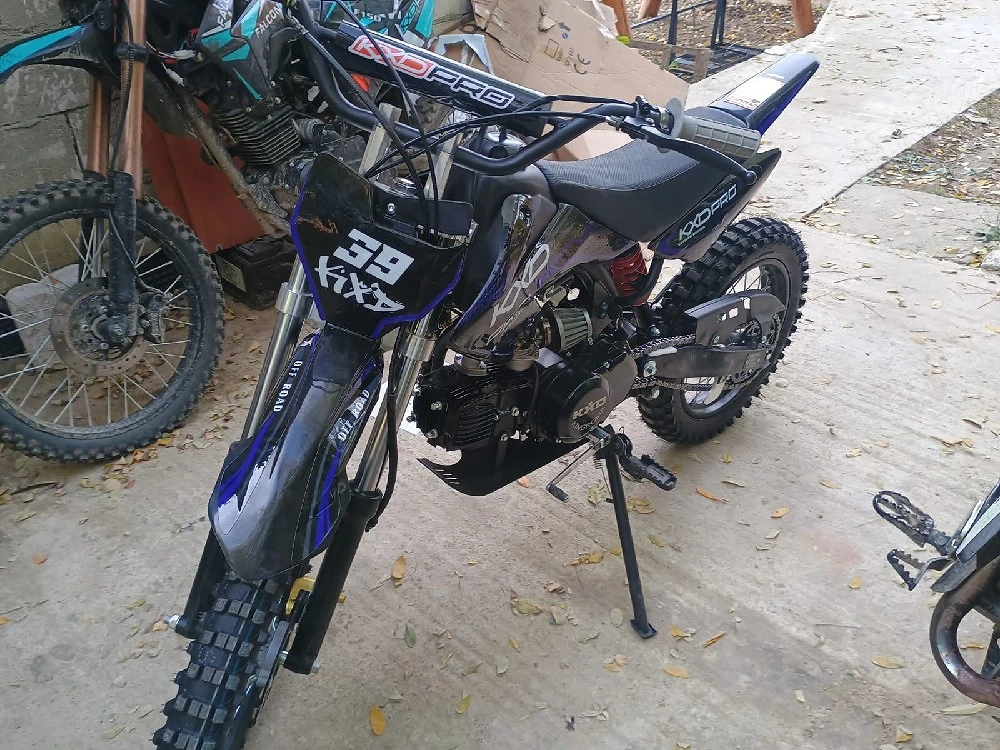 vând kxd 125cc 