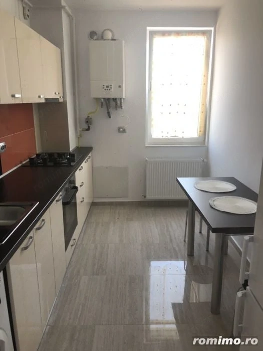Garsoniera de inchiriat in zona Costin Georgian cu centrala proprie
