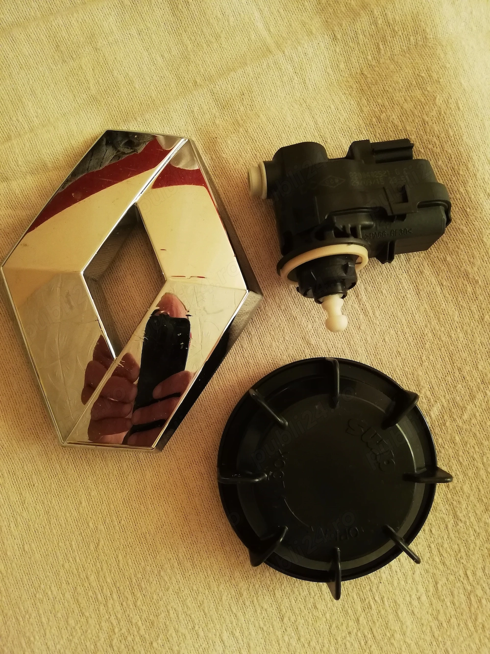 Vand reglaz far, sigla si capac far Renault pe original