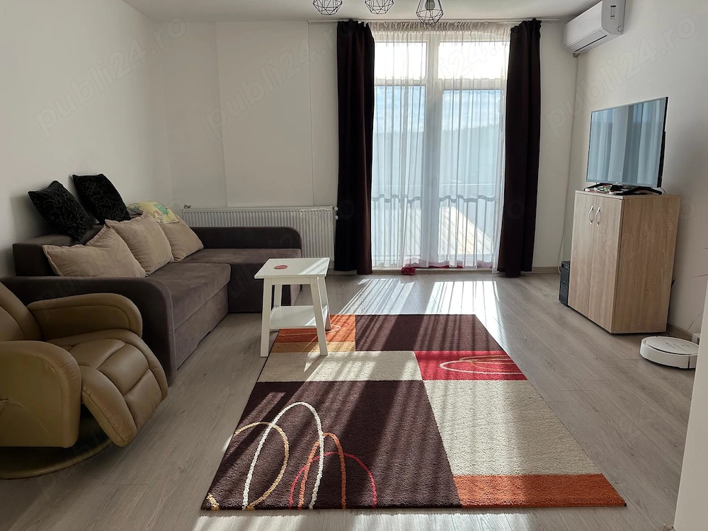 Apartament ultrafinisat si mobilat, cu parcare subterana, centrala proprie si aer condiționat