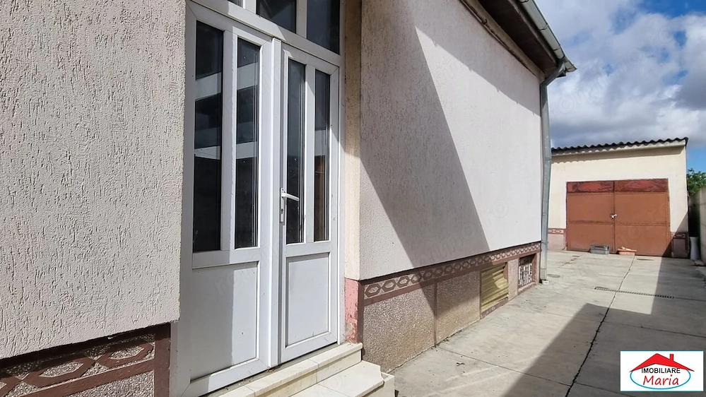 Casa parter cu teren 9 arii Titulescu